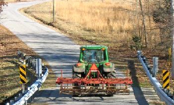 Farm tractors on roadways